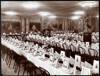 Banquet hall with table set for the National Biscuit Co. banquet, New York